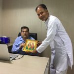 Mr Vishnu Tripathy, Managing Editor, Dainik Jagaran receiving godly gift after tying Rakhi